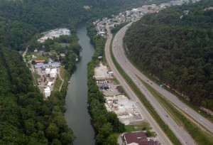 Freedom Industries tank "farm" on the Elk River. Photo by Vivian Stockman taken in 2014.  The tank farm is now razed, but you can still get wafts of the sickening MCHM smell. 